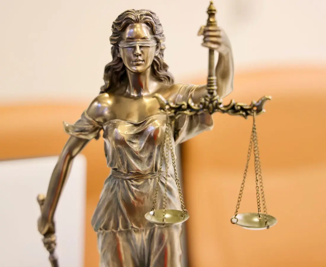 Lady Justice statue with scales — civil rights practice, Ave Maria Law Center